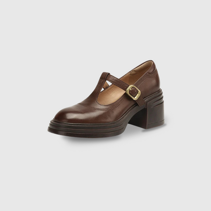 Brown chunky Mary Jane pump with buckle strap and dark stacked platform sole