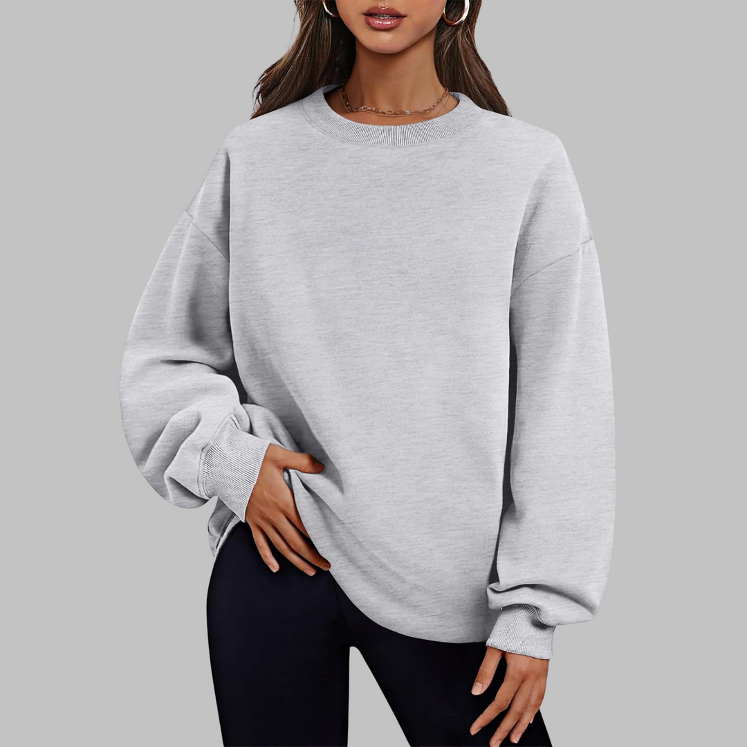 Light gray oversized crewneck long sleeve sweater with ribbed cuffs and hem