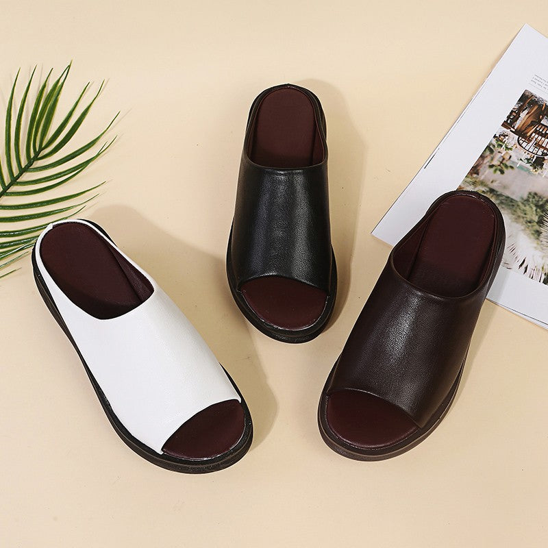 Orthopedic sandals, black open-toe slip-on with thick sole and rounded footbed