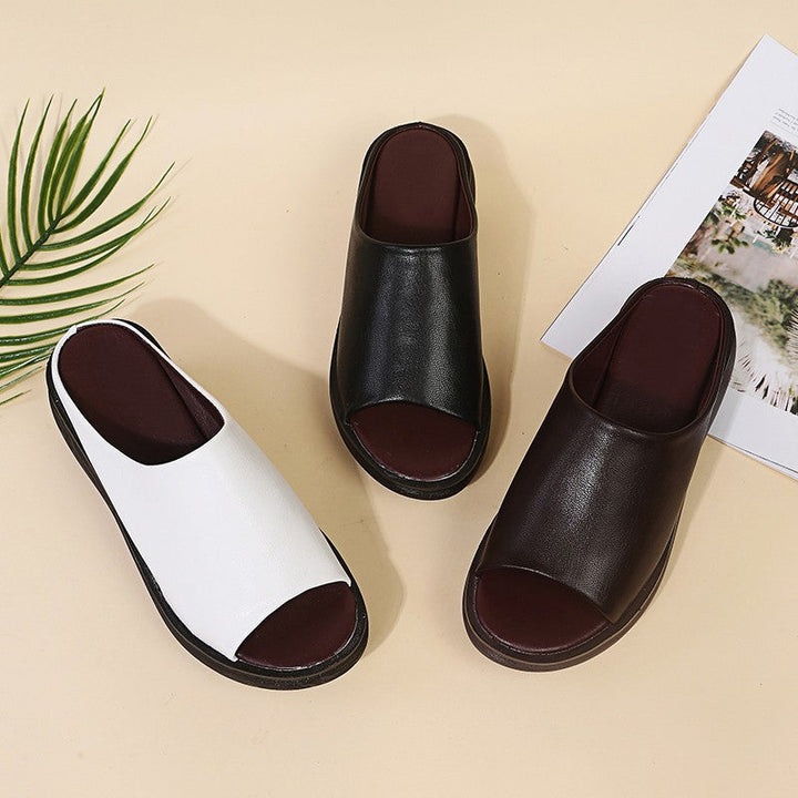 Orthopedic sandals, black open-toe slip-on with thick sole and rounded footbed