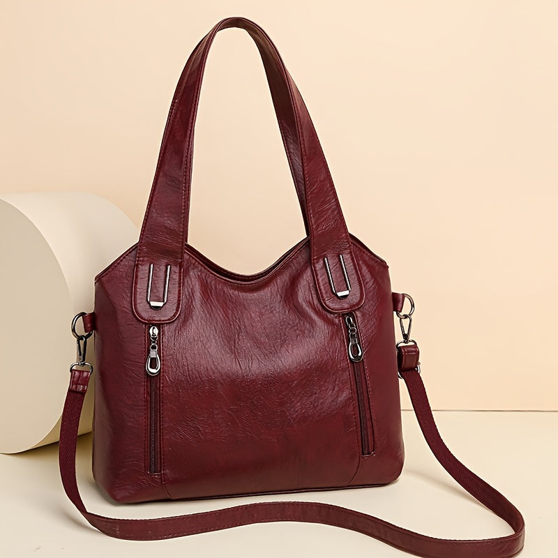 Lumi women’s classic tote bag in burgundy with dual handles, top zip, and crossbody strap