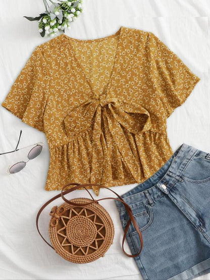 Mustard floral v-neck flowy top with short sleeves and tied front detail