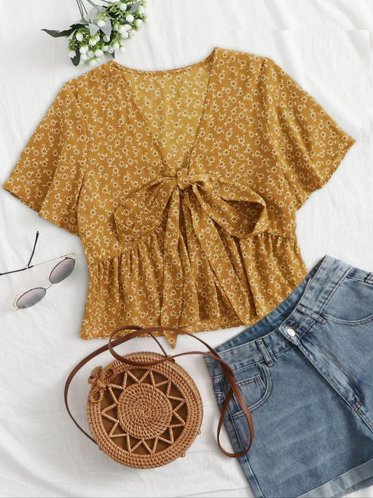 Mustard floral v-neck flowy top with short sleeves and tied front detail