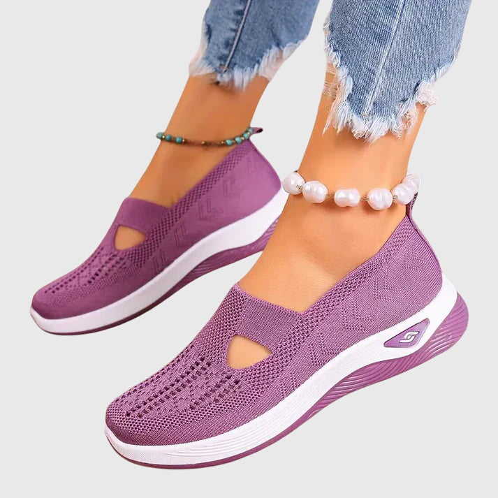 Mia orthopedic walking shoes in purple with knit upper, side cutouts, and white sole