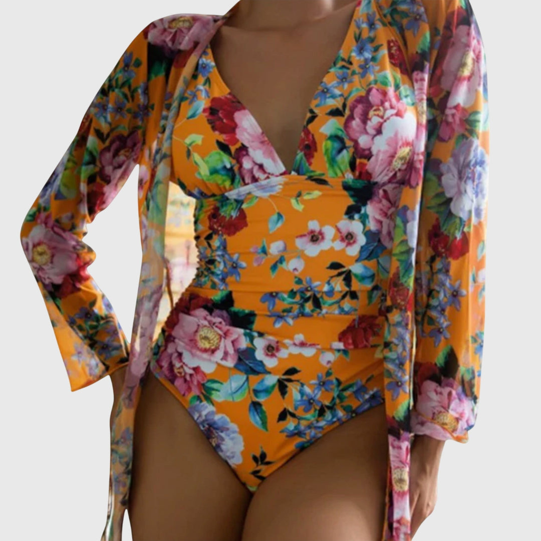 Floral orange swimsuit set with V-neck top, high-rise bottoms, and long open robe
