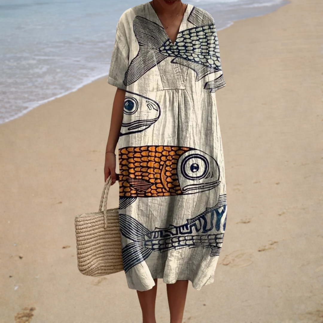 Comfortable summer dress with V-neck and half sleeves, colorful fish print, loose fit.
