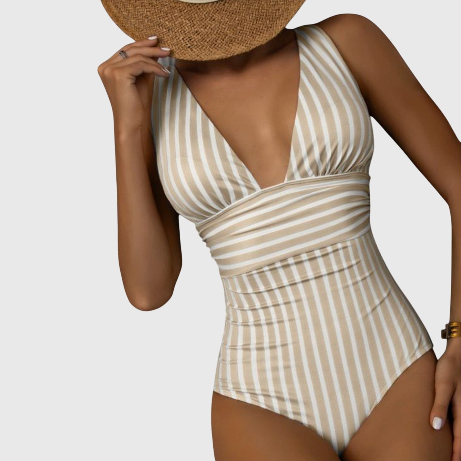 Beige and white striped one-piece swimsuit with deep V-neck