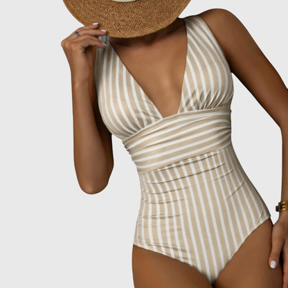 Beige and white striped one-piece swimsuit with deep V-neck