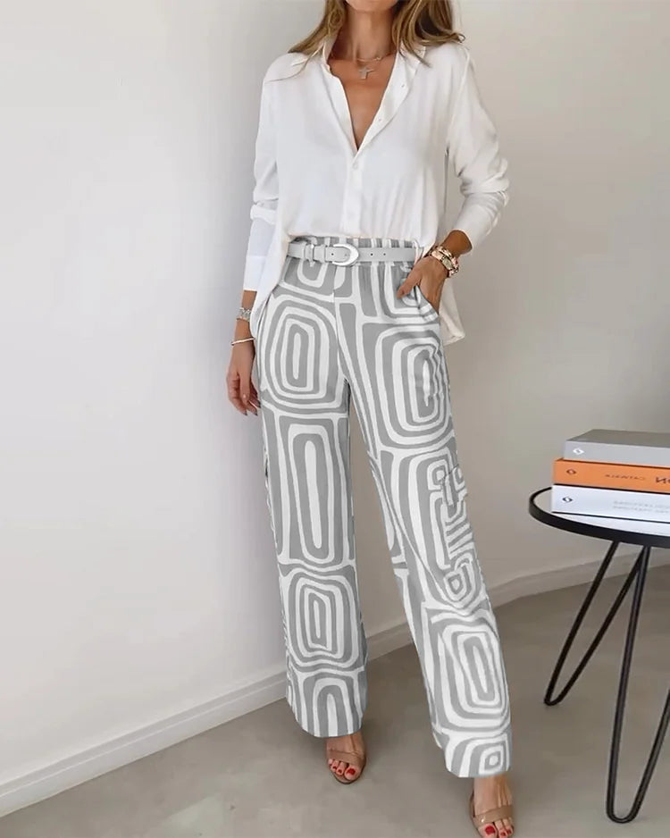 Two-piece set with white button-front blouse and grey abstract-pattern trousers with belt