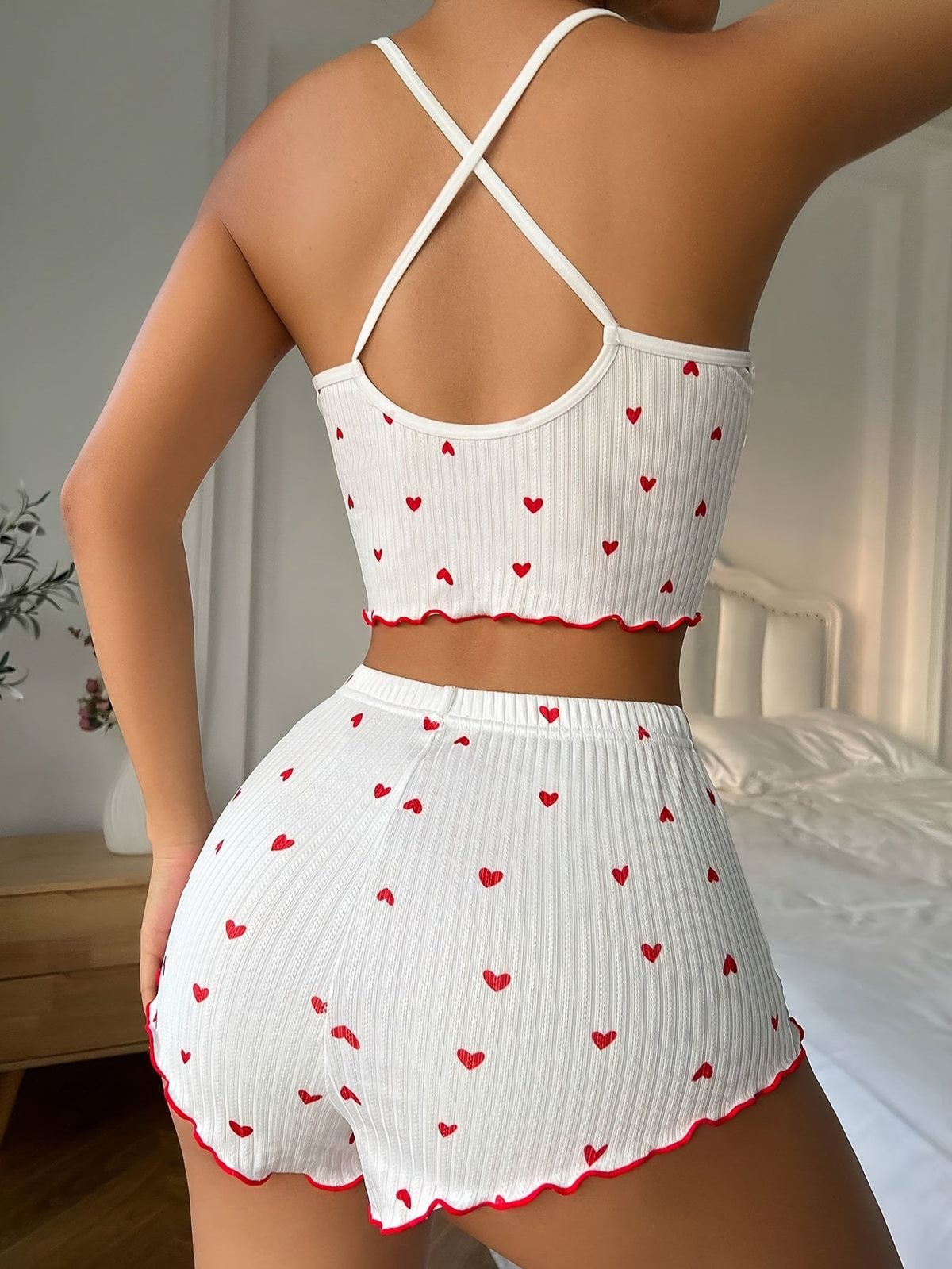 White heart-print pajama set with ruffle trim, crisscross back straps and matching shorts