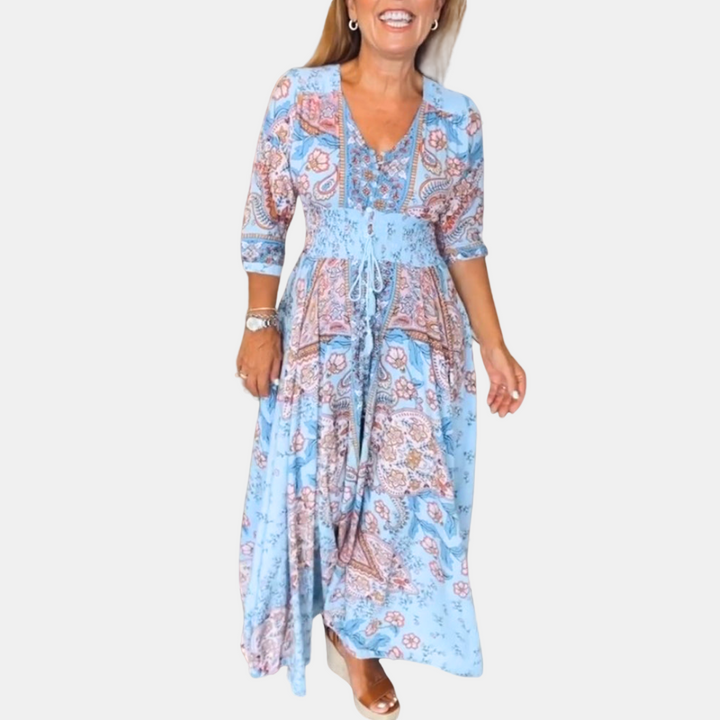 Blue paisley long sleeved summer dress, V-neck and drawstring waist, tiered skirt.