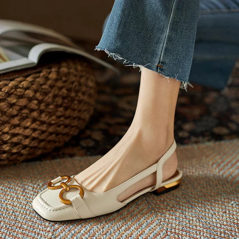 Beige orthopedic sandals with gold-tone link strap and open side design