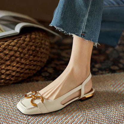 Beige orthopedic sandals with gold-tone link strap and open side design