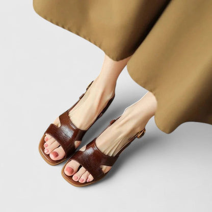 Brown orthopedic comfy slide sandals with open toe and adjustable strap