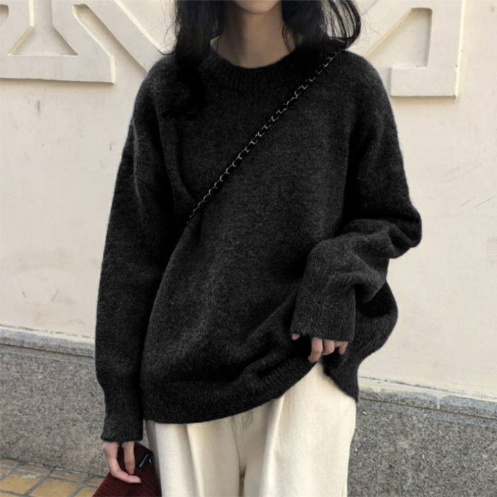 Black casual long-sleeve sweater with round neck and ribbed cuffs and hem