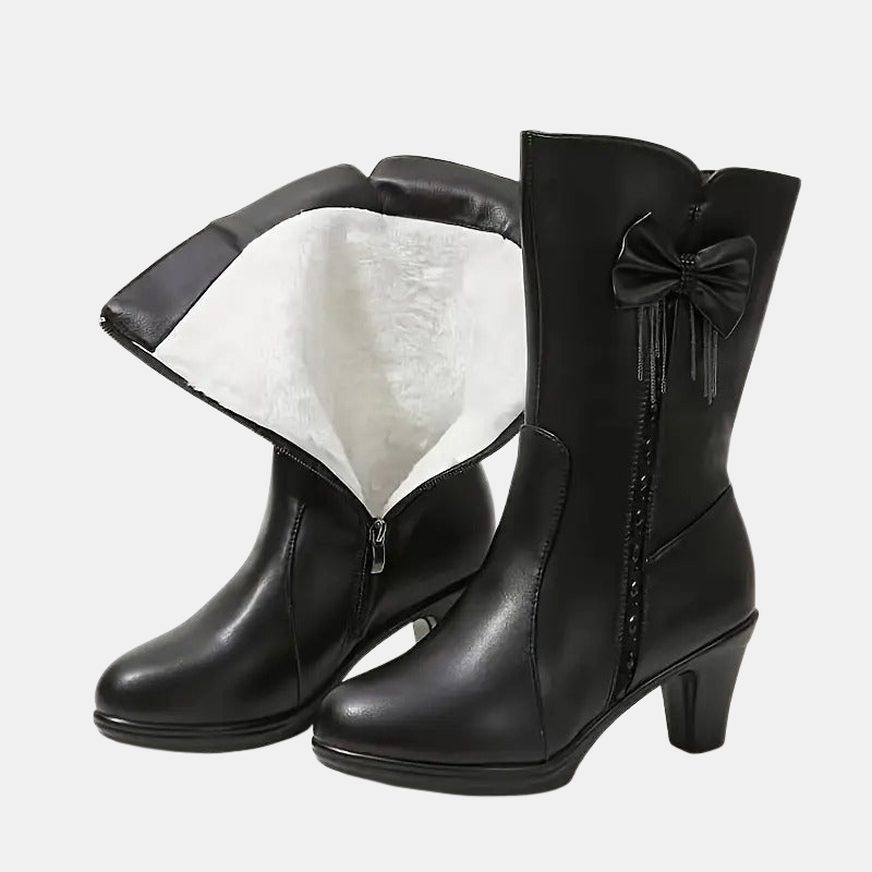 Vintage bow leather boots, black, back view with bow on shaft and inner lining