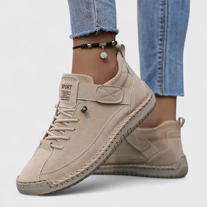 Orthopedic sneakers in beige with lace-up front, ankle strap, and stitched rubber sole