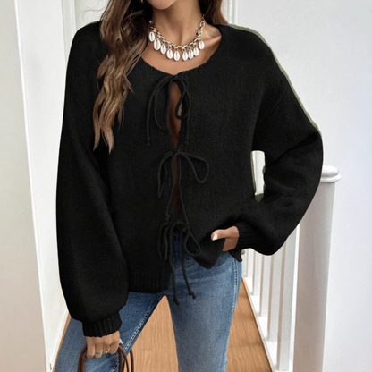 Black tie-front cardigan with round neck and drawstring lacing, long sleeves
