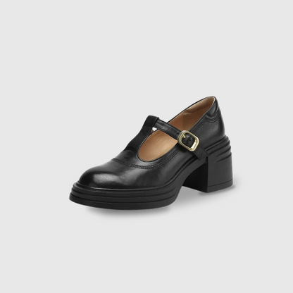 Black chunky Mary Jane pump with buckle strap and dark stacked platform sole