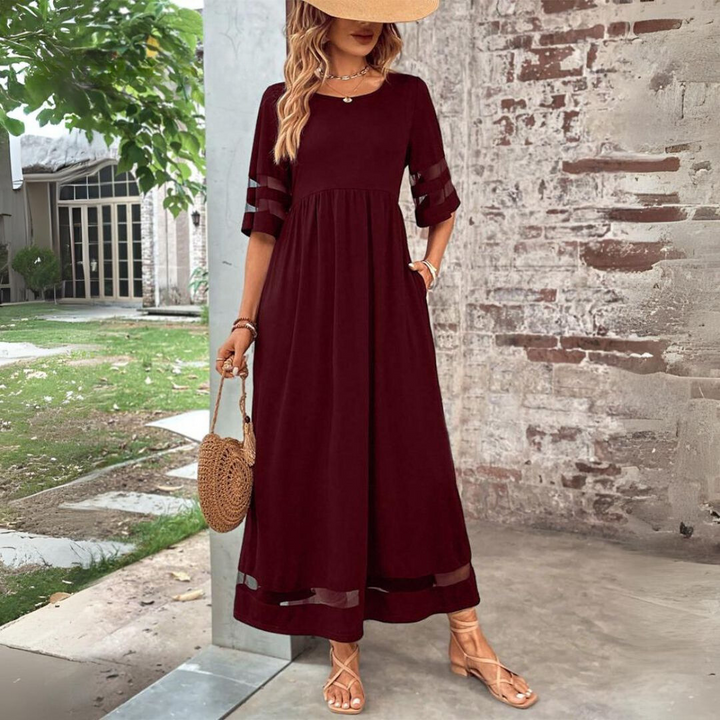 Burgundy maxi dress with scoop neck, tiered waist, and striped 3/4 sleeves