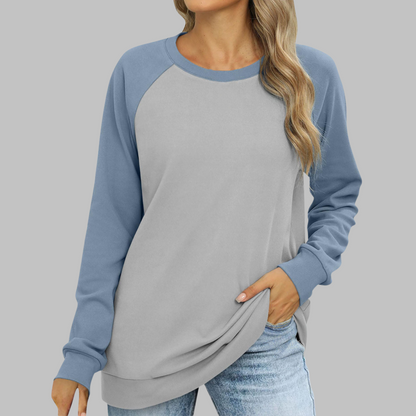 Two-tone raglan sweatshirt, round neck, long sleeves; light gray body, blue sleeves
