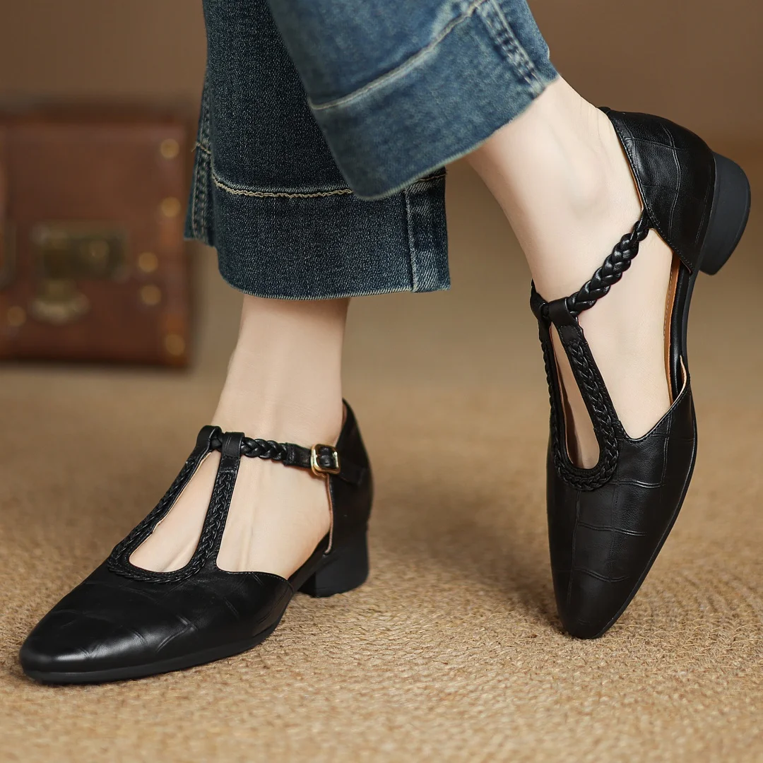 Black leather Mary Jane low heel with braided ankle strap and open cutout toe
