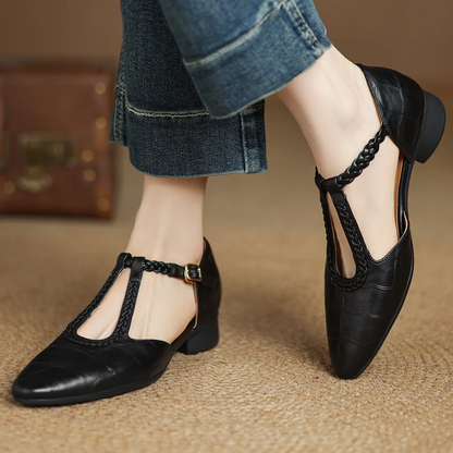 Black leather Mary Jane low heel with braided ankle strap and open cutout toe