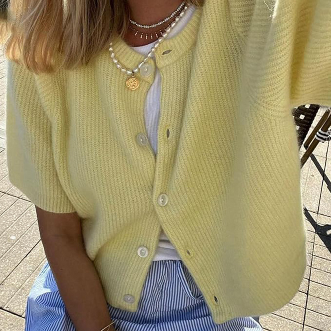 Lightweight short sleeve button cardigan, light yellow knit with front buttons and ribbed texture