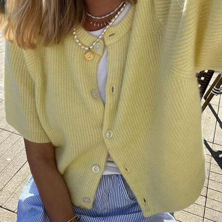 Lightweight short sleeve button cardigan, light yellow knit with front buttons and ribbed texture