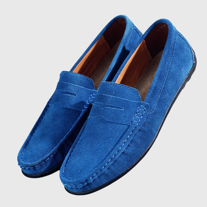 Light blue suede orthopaedic loafers with slip-on penny strap and stitched seam