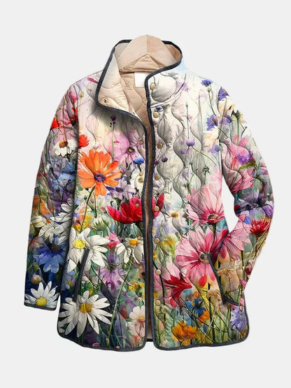 Quilted floral jacket with front zipper, multicolor print and dark trim.