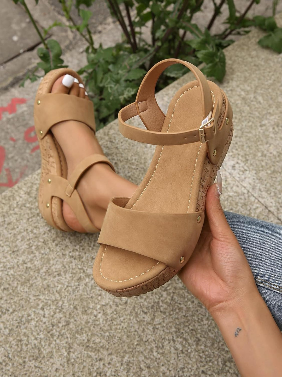 Khaki wedge sandals with side buckle strap and stud accents, open toe