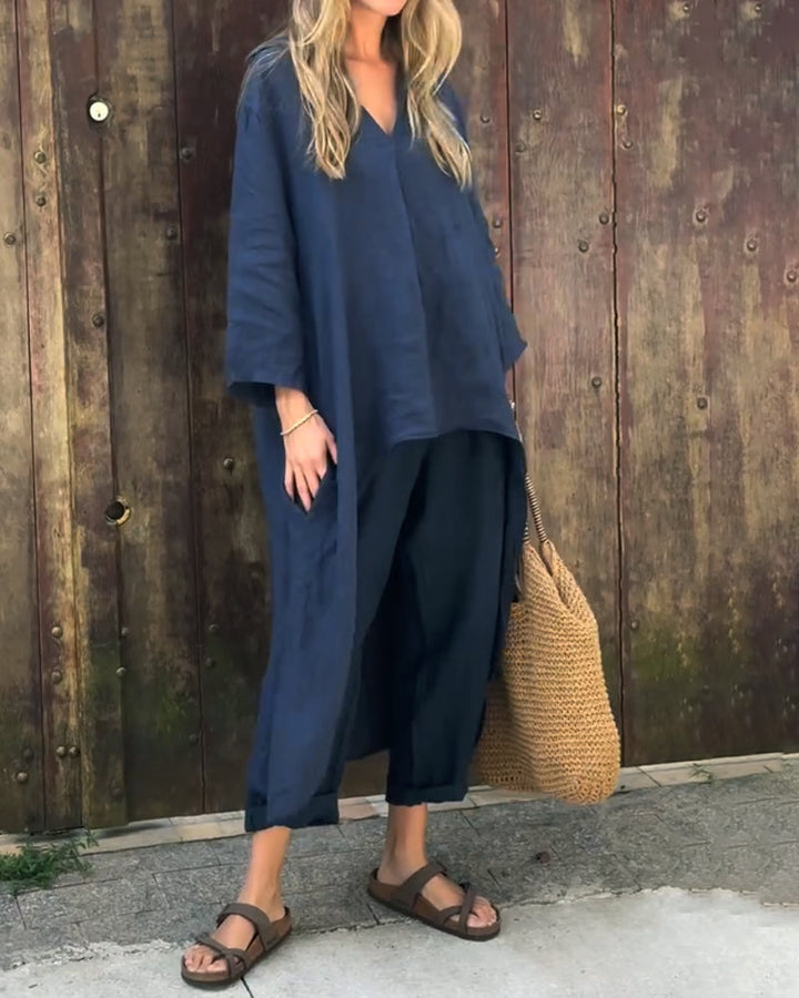Navy blue V-neck tunic top and relaxed-fit cropped pants two-piece set