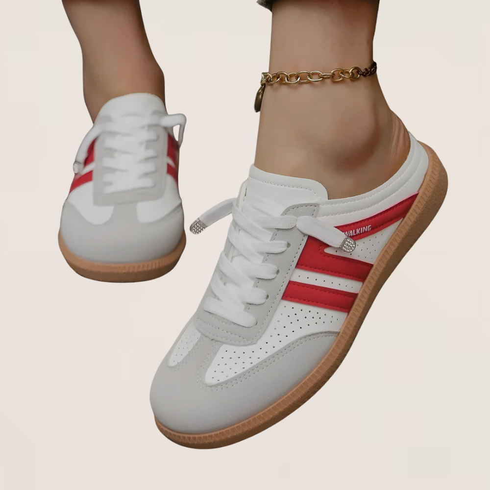 White retro sneakers with red side stripes and gum sole, lace-up style.