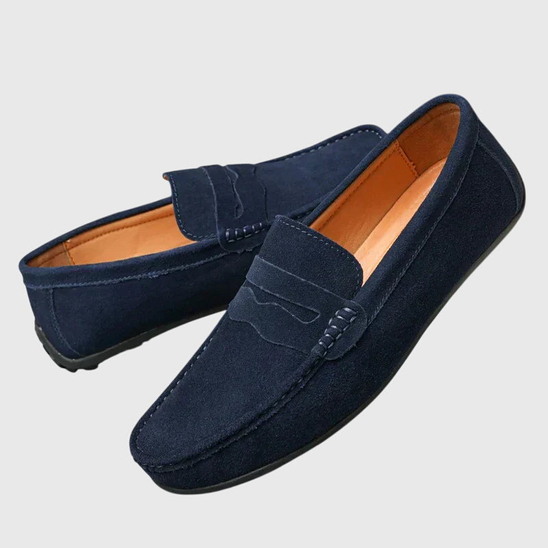 Navy suede orthopaedic loafers with slip-on penny strap and stitched moccasin stitching