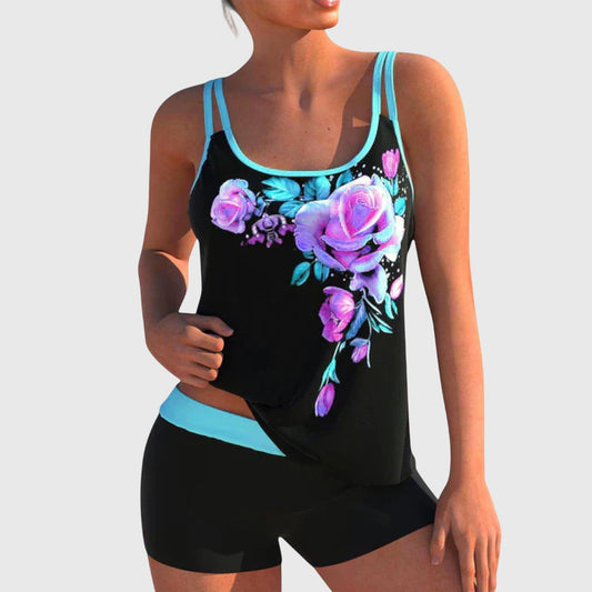 Two-piece swimsuit with purple rose print on black, turquoise trim, scoop neck