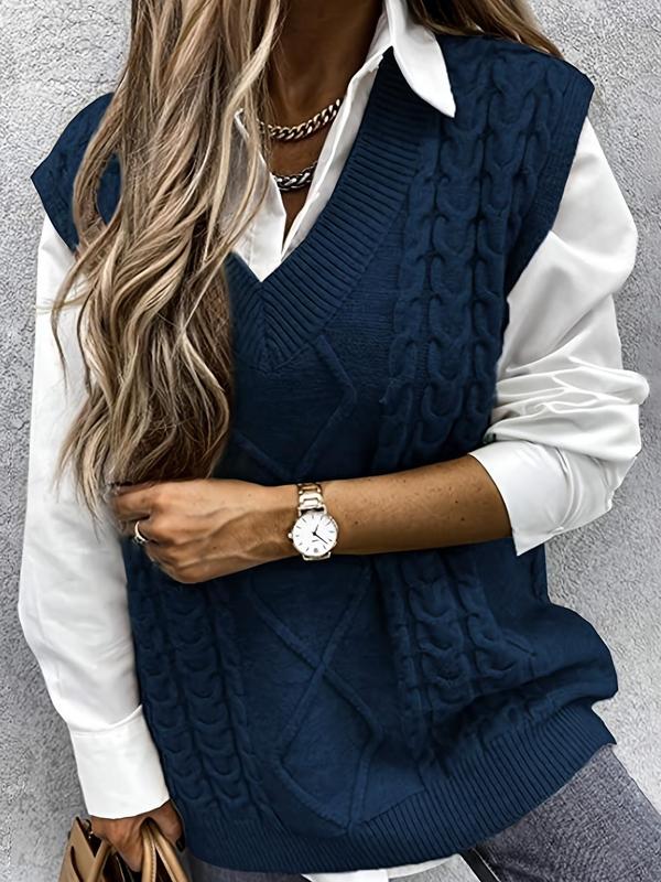 Navy blue textured V-neck knit vest with cable pattern and ribbed hem trim