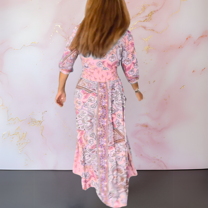 Pink paisley long summer dress, back view, gathered waist with tie, flared tiered skirt.