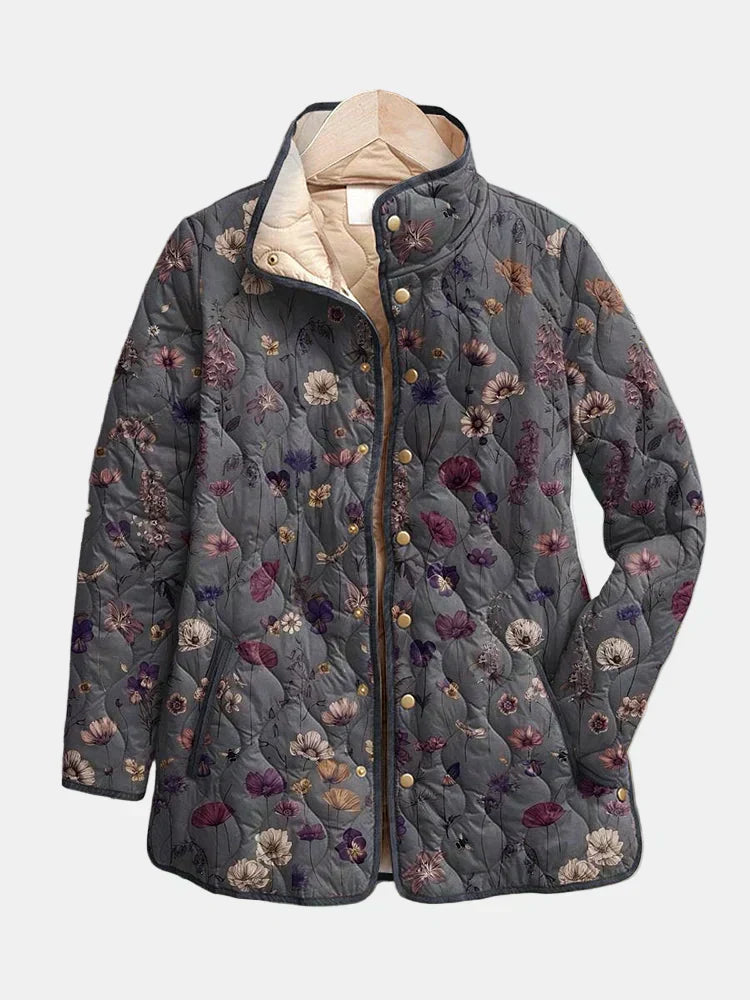 Quilted vintage floral print jacket with dark fabric and button front, long sleeves