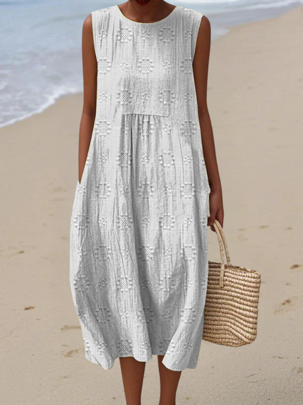 Embroidered midi dress, sleeveless, light white with tiered skirt and floral embroidery