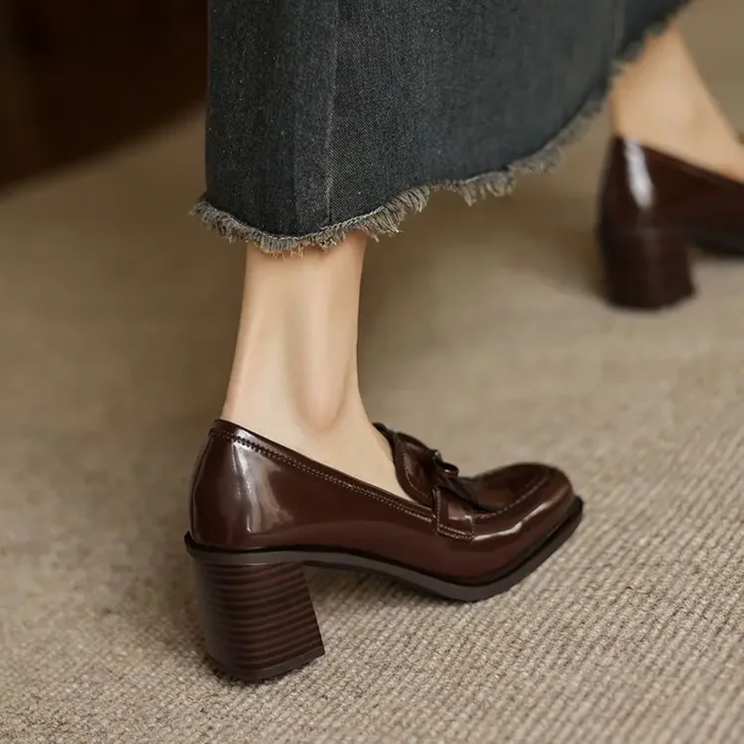 Brown loafer pumps with glossy upper and block heel