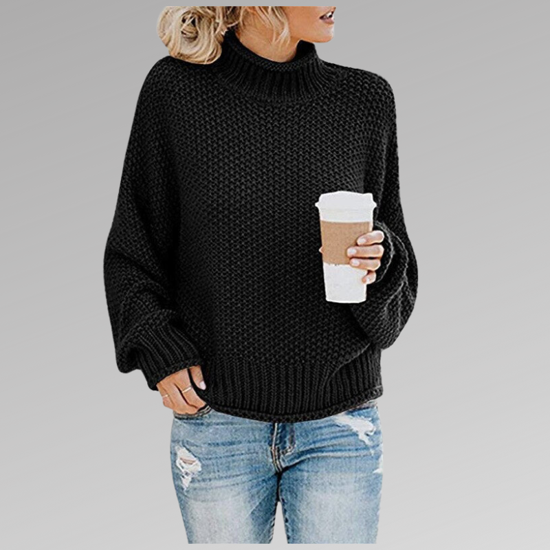 Black oversized winter sweater, chunky knit, ribbed high neck and cuffs