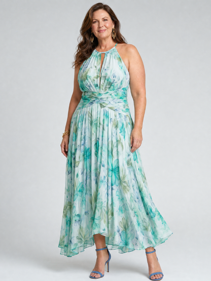 Green halter midi dress with pleated skirt and soft floral print, front view