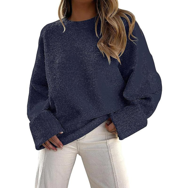 Navy blue crewneck long-sleeve pullover sweater with ribbed cuffs and hem