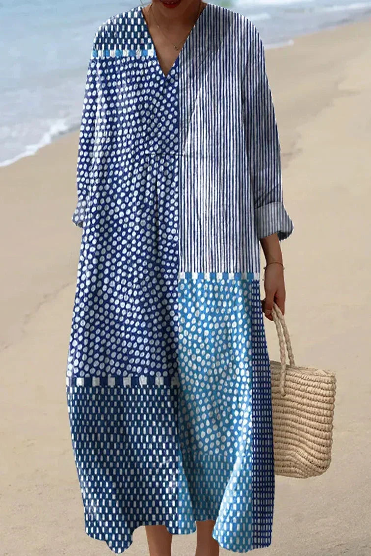Blue patchwork midi dress with button-front, long sleeves, dots and stripes panels.