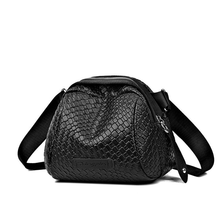 Black woven-texture shell crossbody bag with zip top and shoulder strap