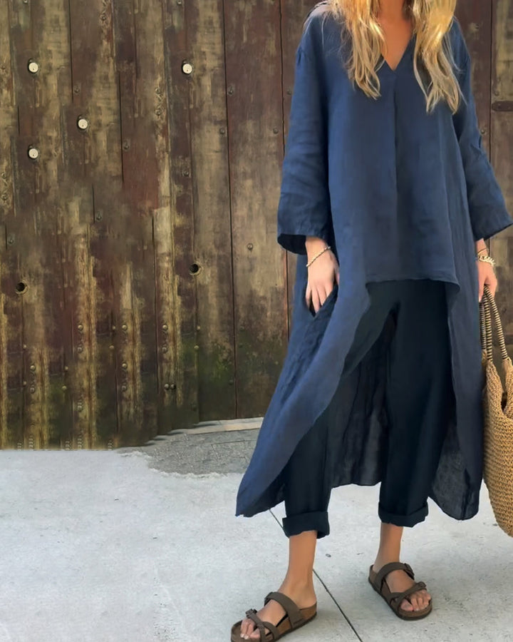 Navy blue long tunic top and relaxed-fit cropped pants two-piece set, side view