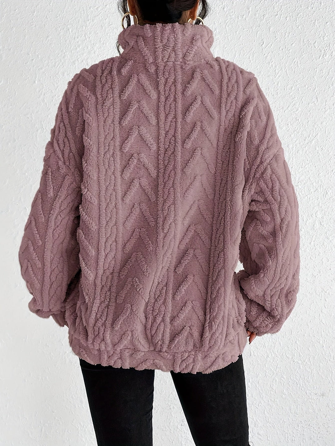 Light purple warm knit sweater with textured cable pattern and high neck