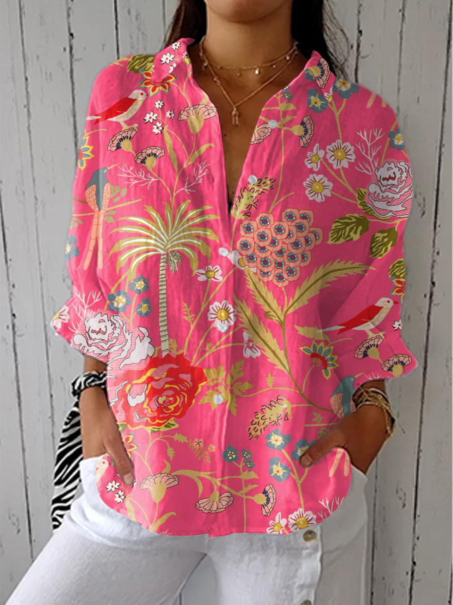 Pink tropical print blouse with V-neck and three-quarter sleeves, multicolor floral motifs