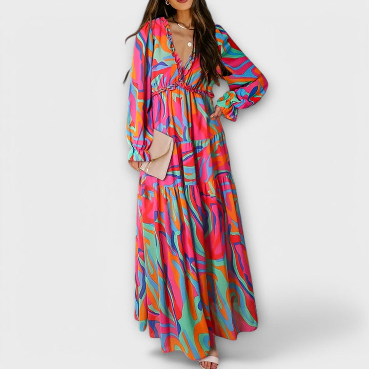 Tiered floral maxi dress with V-neck, long sleeves and colorful abstract print